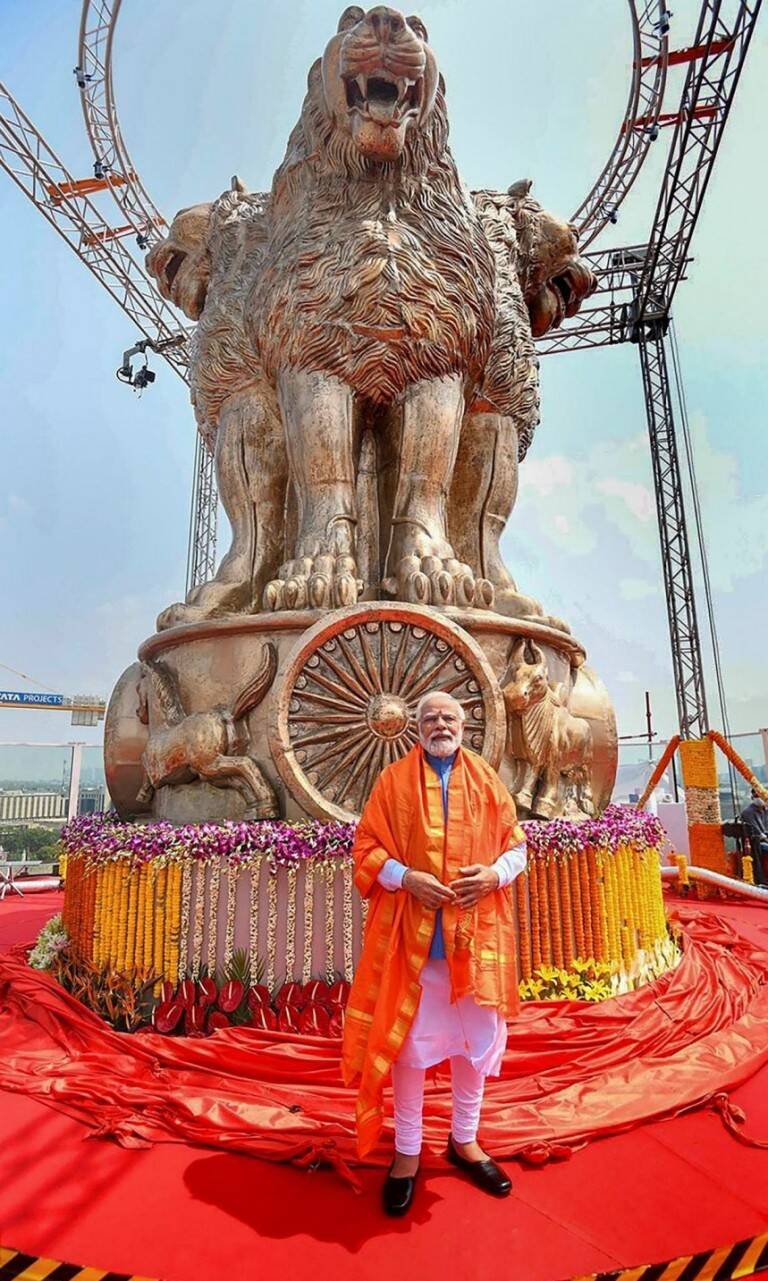 A BIG National Emblem atop NEW Parliament building